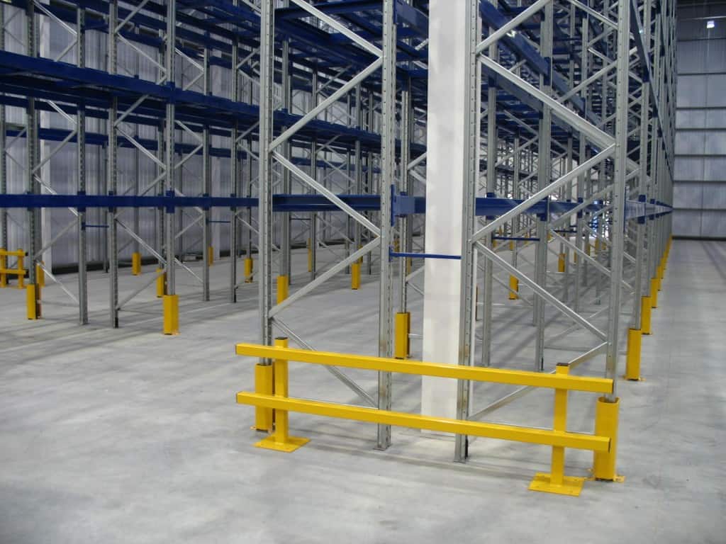 Heavy Duty Barrier for Pallet Racking Protection manufactured, designed and installed by S.E.M.CO – UK Suppliers of heavy-duty warehouse and Yard Racking